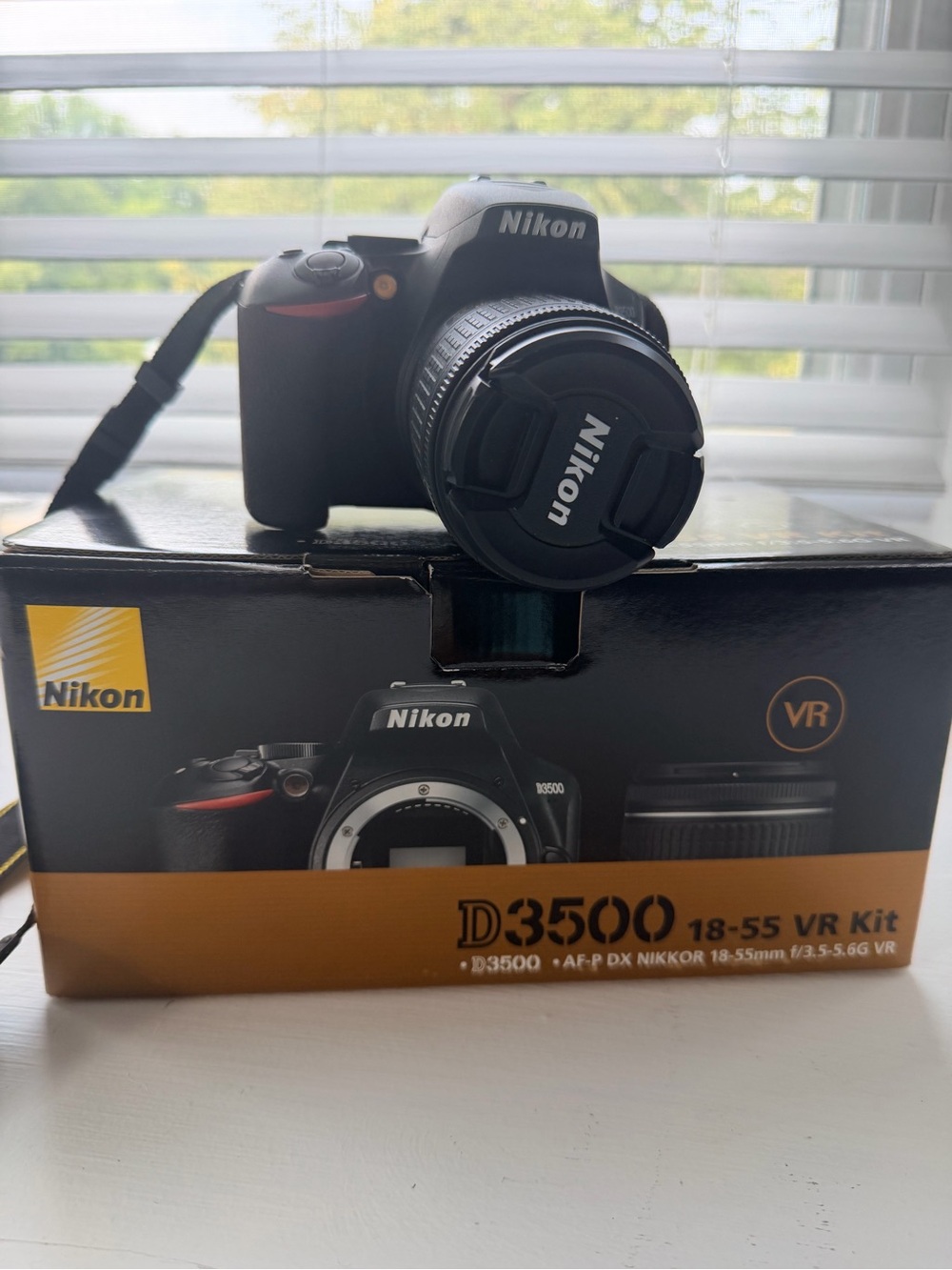 Nikon D3500 DSLR Camera Kit in Black with Orange Accent